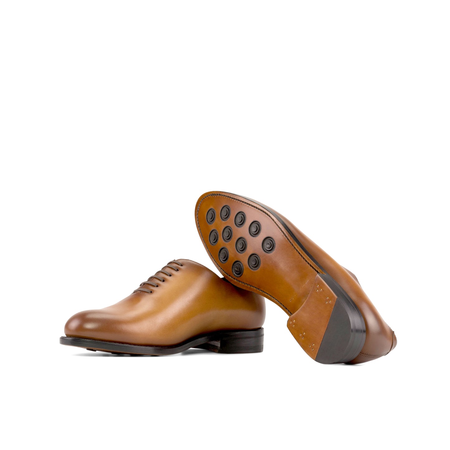 Whole cut cognac Goodyear Welt, leather sole with buttons rubber injections