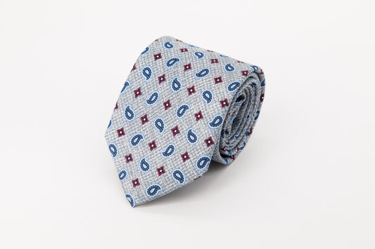 TIE - Blue And Red Medallion On Sky Blue Background