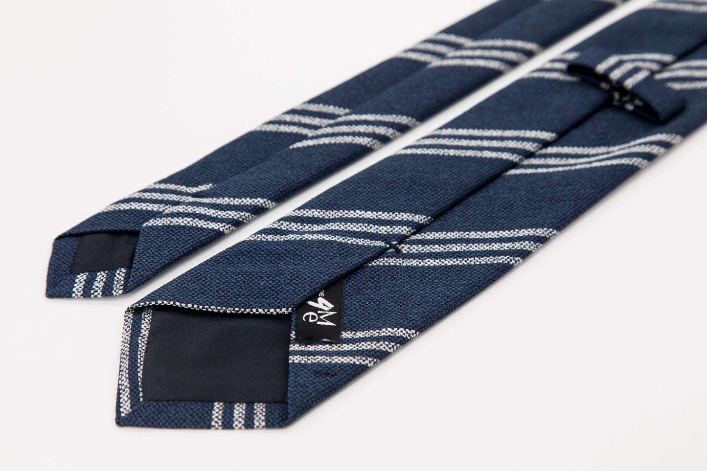 TIE - Thin Diagonal White Stripe on Navy Blue Background